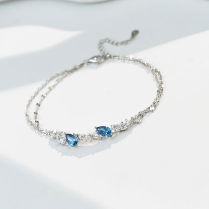 この人気のレディースブレスレットは、925スターリングシルバー製で、低アレルギー性。夏、花火大会、記念日などに最適です。シンプルなダブルチェーンデザインが特徴です。